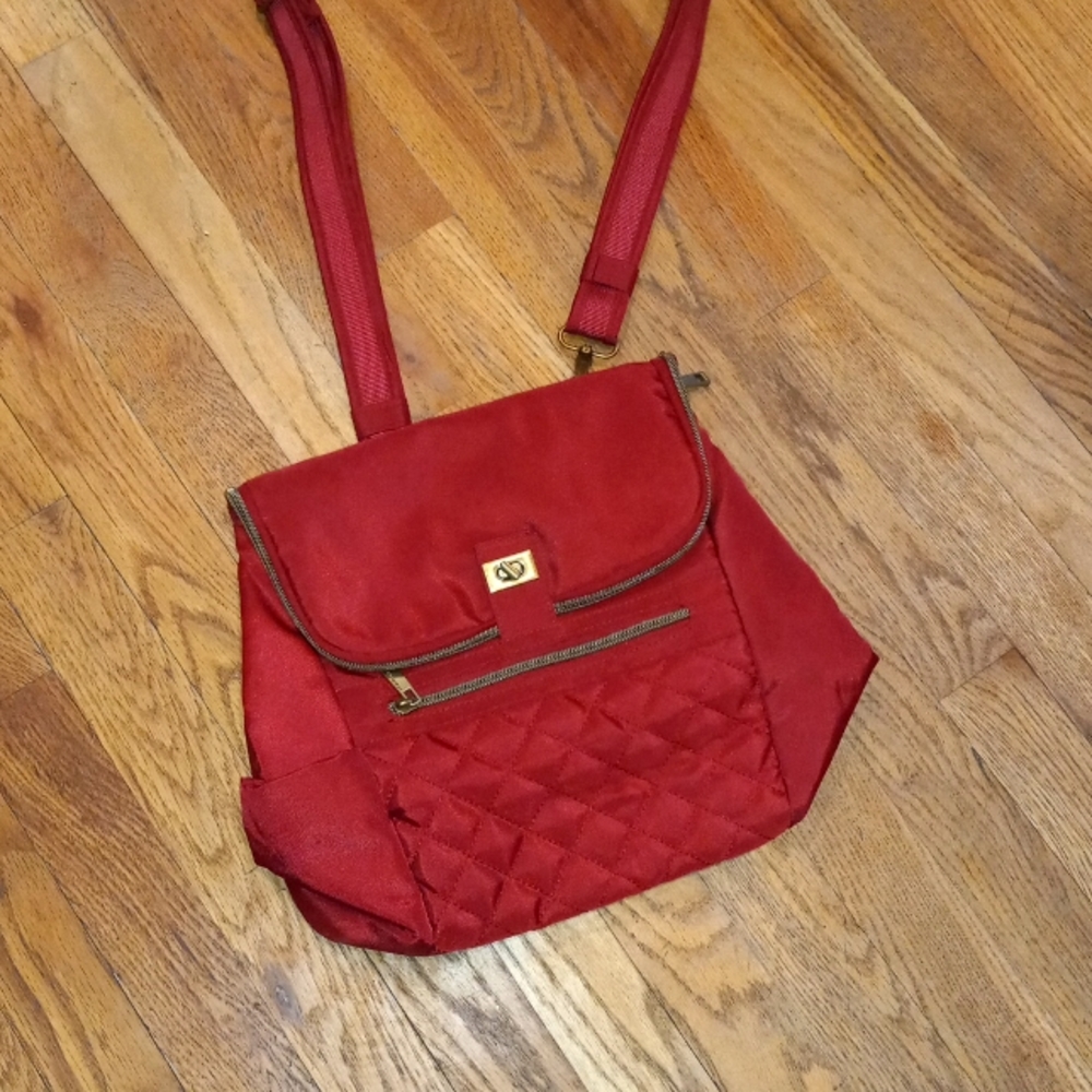 Red Travelon anti-theft backpack travel Crossbody